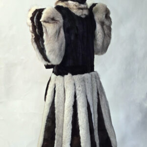 Black and white fur bitch suit with restrictive sleeves and pleated skirt — front view on mannequin — D&Y Furs